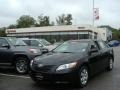 Black - Camry LE Photo No. 1