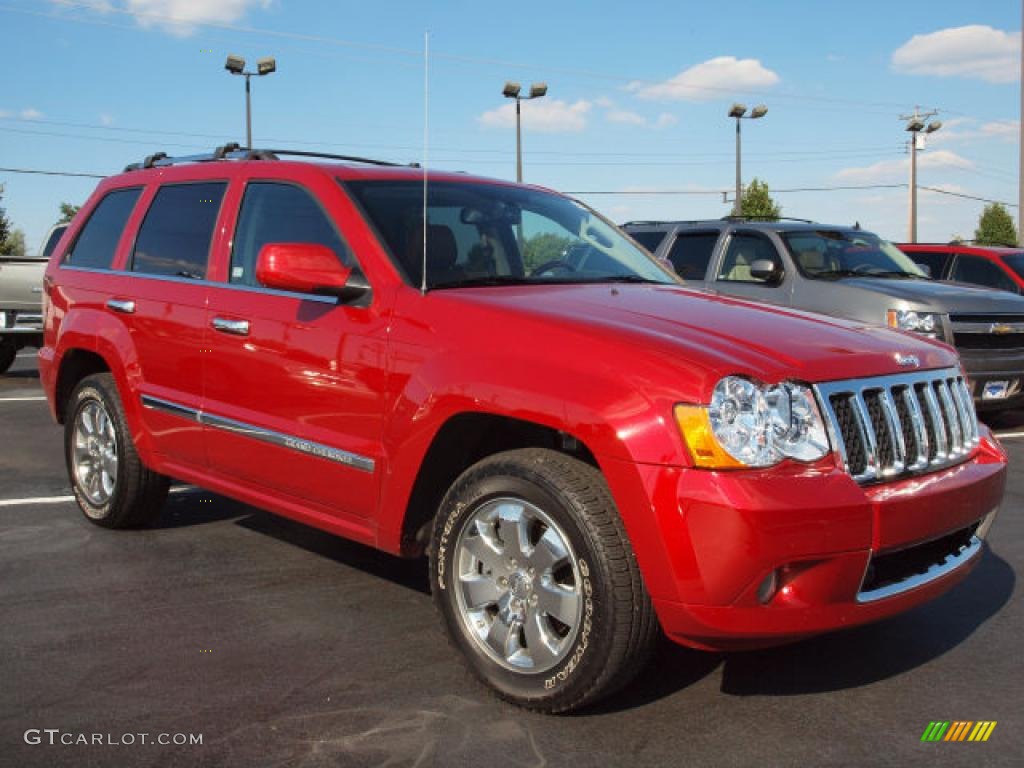 2009 Grand Cherokee Overland 4x4 - Blaze Red Crystal Pearl / Saddle Brown Royale Leather photo #2