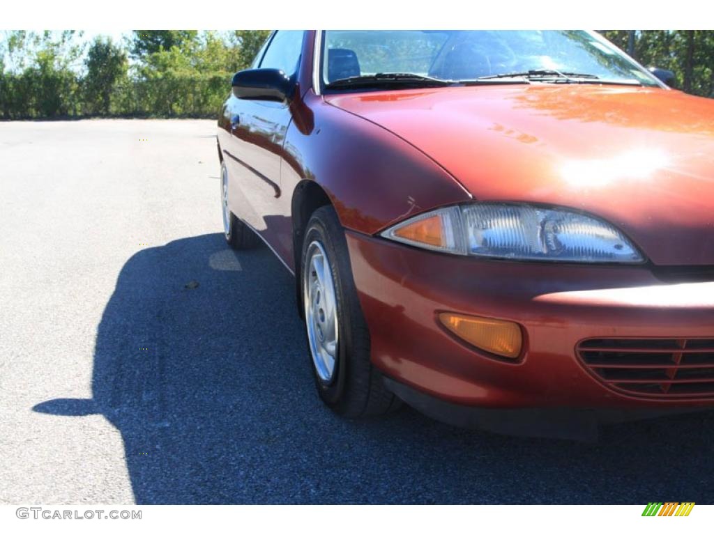 1998 Cavalier Coupe - Cayenne Red Metallic / Neutral photo #9