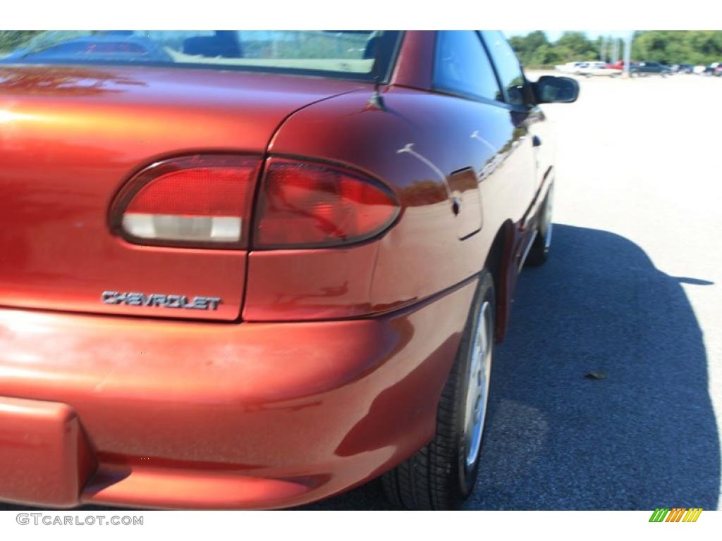 1998 Cavalier Coupe - Cayenne Red Metallic / Neutral photo #12