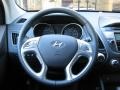 Black 2011 Hyundai Tucson Limited Steering Wheel