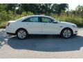 White Suede - Taurus SEL Photo No. 2