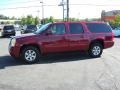 Red Jewel Tintcoat 2010 GMC Yukon XL SLT