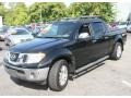 2009 Super Black Nissan Frontier LE Crew Cab 4x4  photo #1