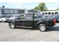 2009 Super Black Nissan Frontier LE Crew Cab 4x4  photo #9