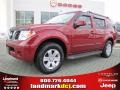 2006 Red Brawn Pearl Nissan Pathfinder LE  photo #1