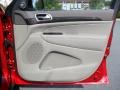 2011 Inferno Red Crystal Pearl Jeep Grand Cherokee Laredo X Package  photo #23