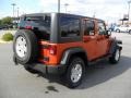 2011 Mango Tango Pearl Jeep Wrangler Unlimited Sport 4x4  photo #4