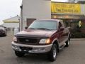 1997 Dark Toreador Red Metallic Ford F150 XLT Extended Cab 4x4  photo #11