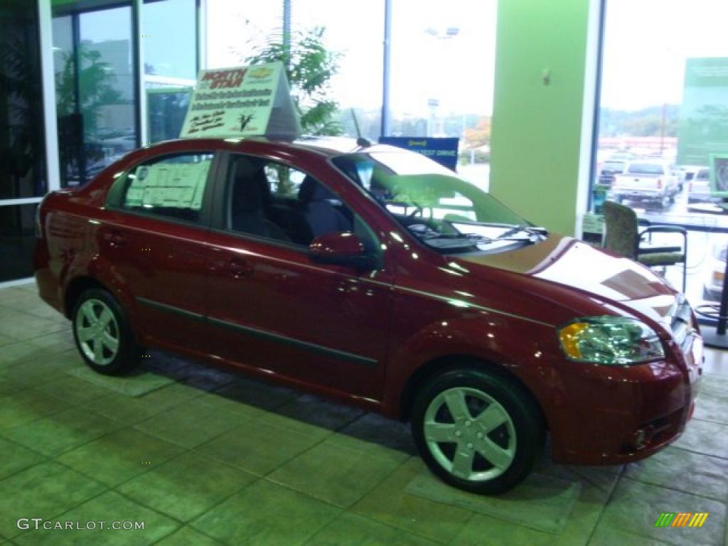 2010 Aveo LT Sedan - Sport Red / Charcoal photo #5