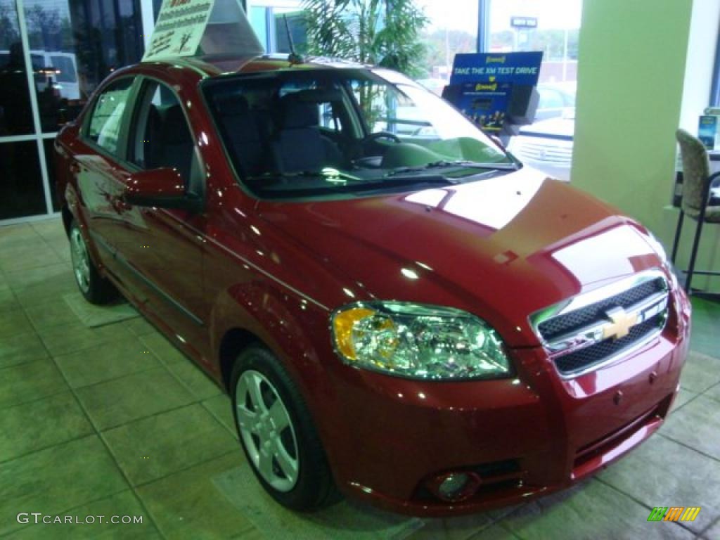2010 Aveo LT Sedan - Sport Red / Charcoal photo #6