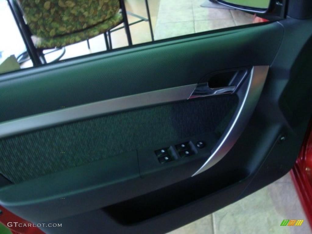 2010 Aveo LT Sedan - Sport Red / Charcoal photo #11