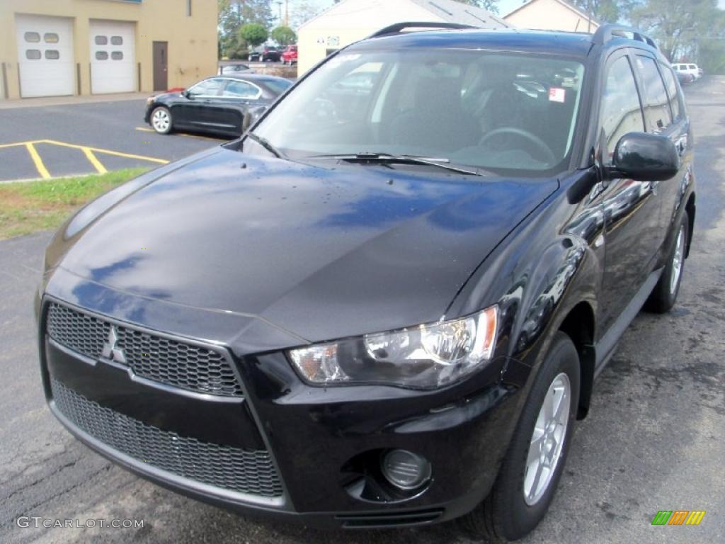 2010 Outlander ES 4WD - Labrador Black Pearl / Black photo #1