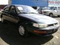 Dark Emerald Pearl - Camry LE Sedan Photo No. 24