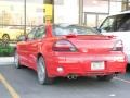 2002 Bright Red Pontiac Grand Am GT Sedan  photo #6