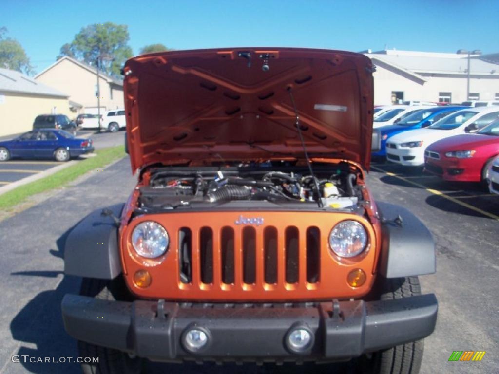 2011 Wrangler Sport S 4x4 - Mango Tango Pearl / Black photo #12