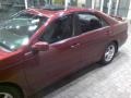 2003 Salsa Red Pearl Toyota Camry SE  photo #20