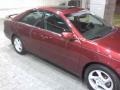 2003 Salsa Red Pearl Toyota Camry SE  photo #21