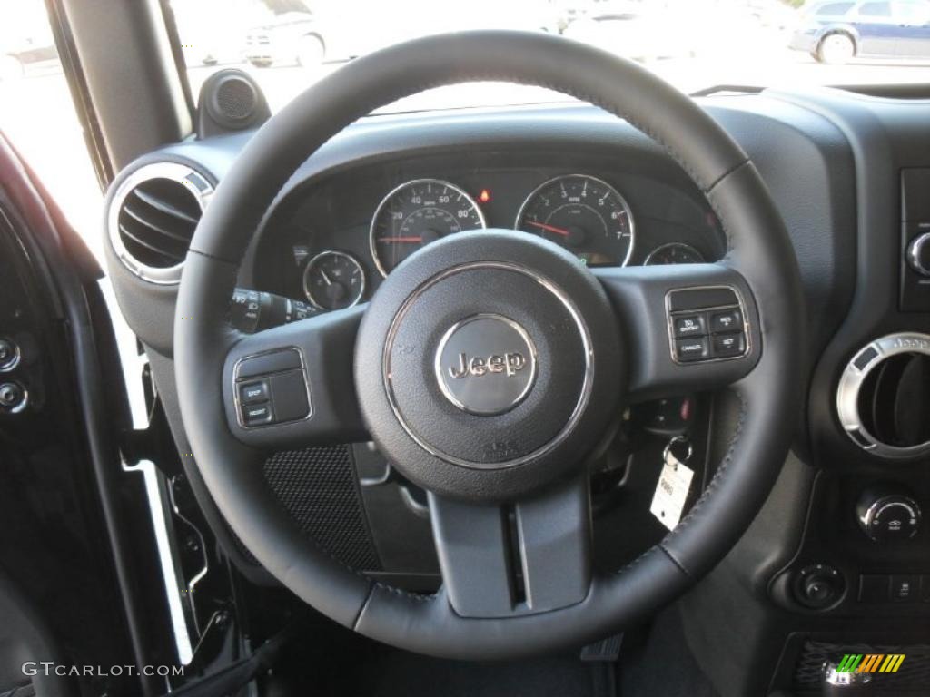 2011 Jeep Wrangler Unlimited Sahara 4x4 Black Steering Wheel Photo #37807764