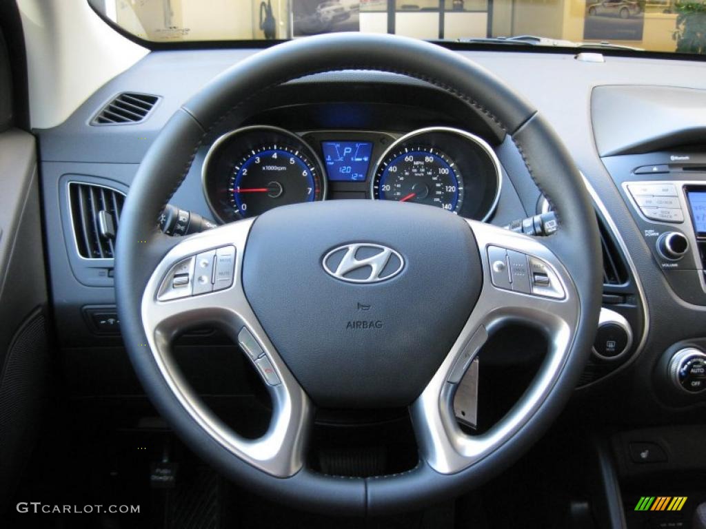 2011 Hyundai Tucson Limited Black/Saddle Steering Wheel Photo #37842231