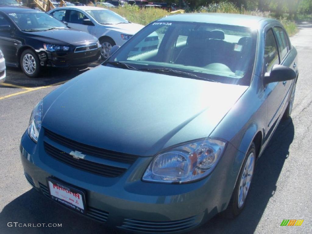 2009 Cobalt LS Sedan - Silver Moss Metallic / Gray photo #1