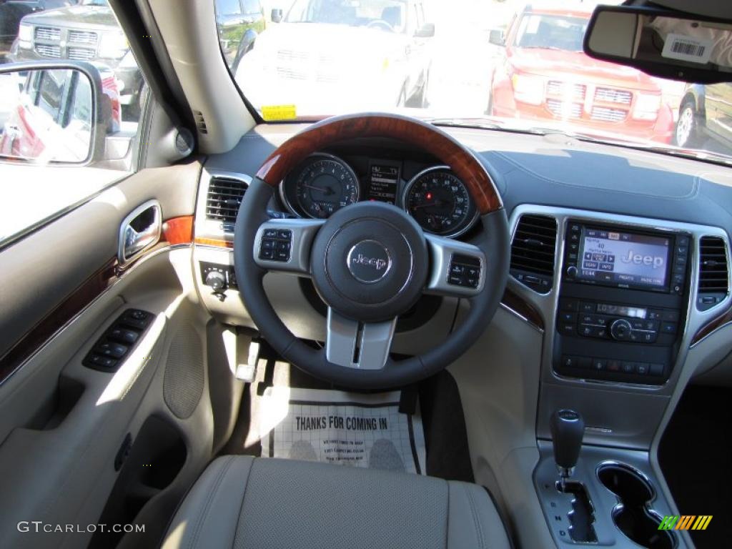 2011 Grand Cherokee Overland - Inferno Red Crystal Pearl / Dark Frost Beige/Light Frost Beige photo #13