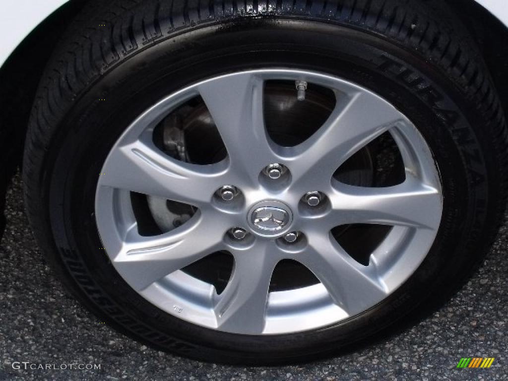 2010 Mazda MAZDA3 i Touring 4 Door Wheel Photo #37921766