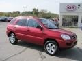 2010 Volcanic Red Kia Sportage LX V6 4x4  photo #1