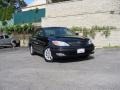 2003 Black Toyota Camry XLE  photo #1