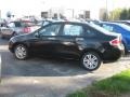 2011 Ebony Black Ford Focus SEL Sedan  photo #1