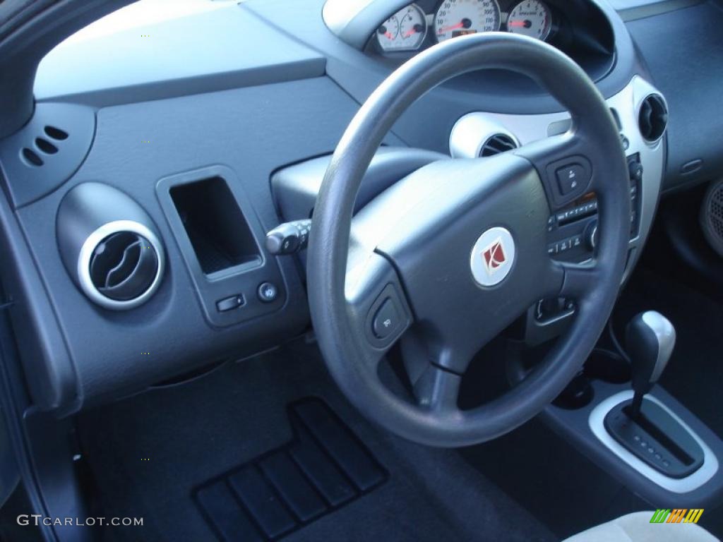 2007 Saturn ION 3 Quad Coupe Tan Steering Wheel Photo #37969504