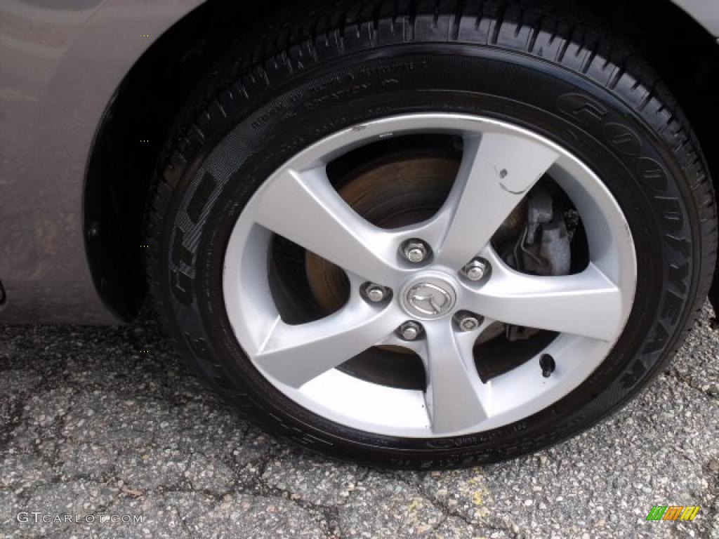 2006 Mazda MAZDA3 i Sedan Wheel Photo #37978196