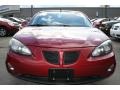 2005 Sport Red Metallic Pontiac Grand Prix Sedan  photo #13