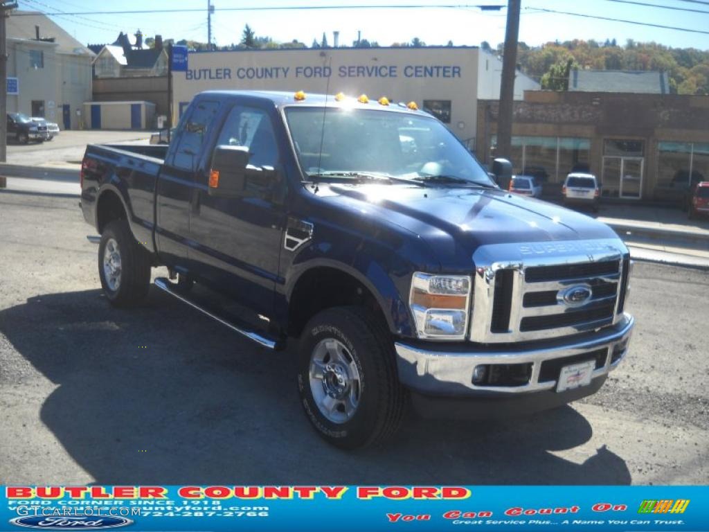 2010 F350 Super Duty FX4 SuperCab 4x4 - Dark Blue Pearl Metallic / Medium Stone photo #1