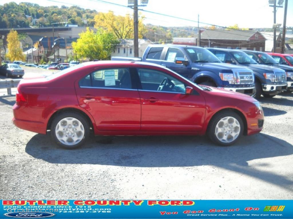 2011 Fusion SE - Red Candy Metallic / Charcoal Black photo #2