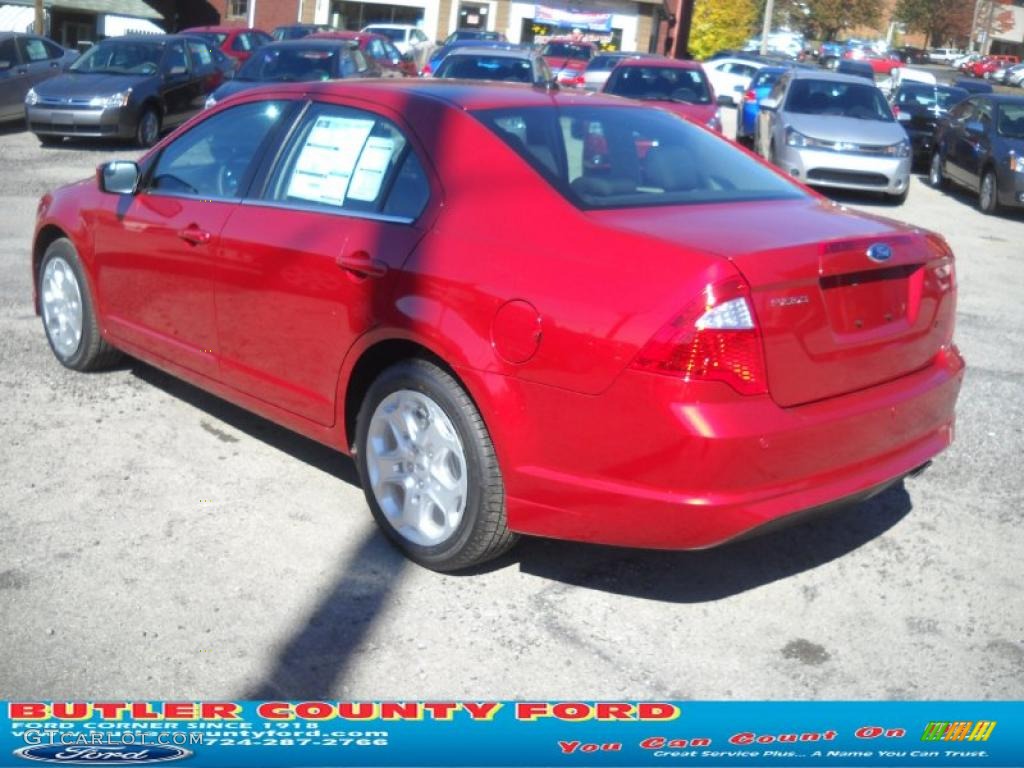2011 Fusion SE - Red Candy Metallic / Charcoal Black photo #5
