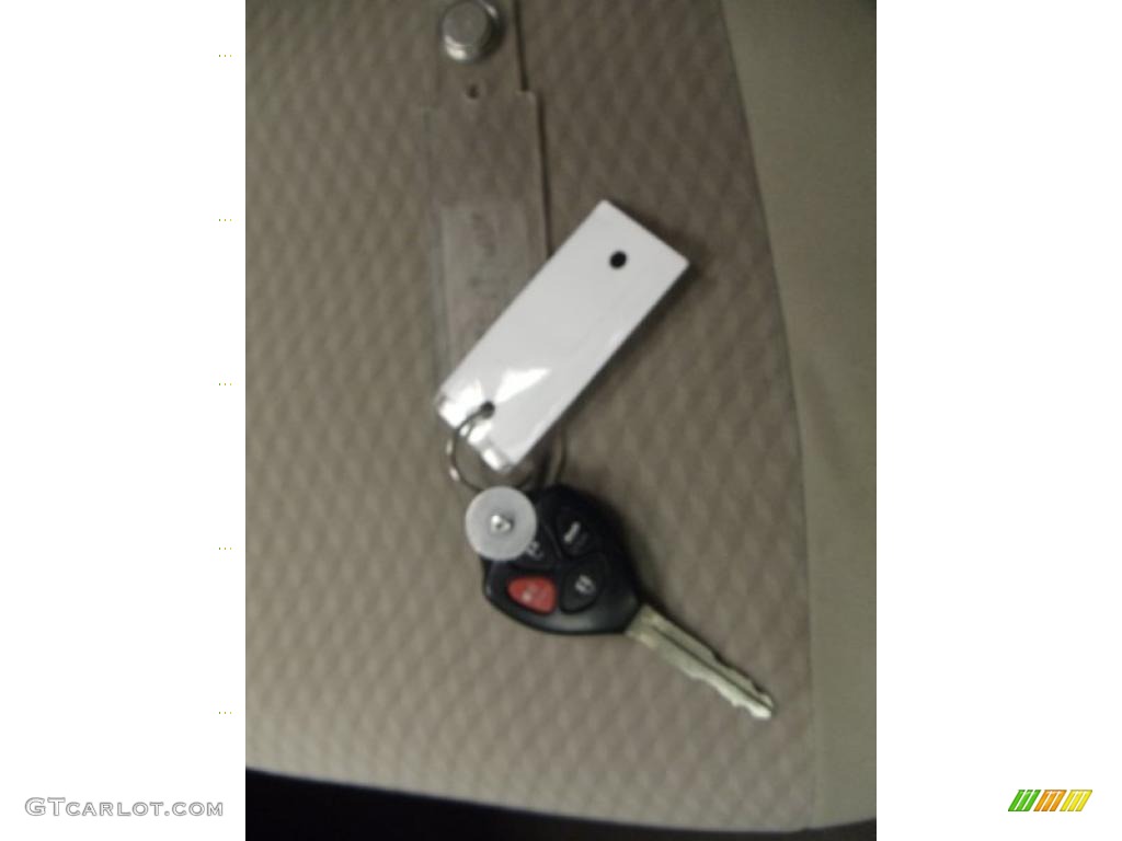 2010 Camry LE - Sandy Beach Metallic / Bisque photo #22