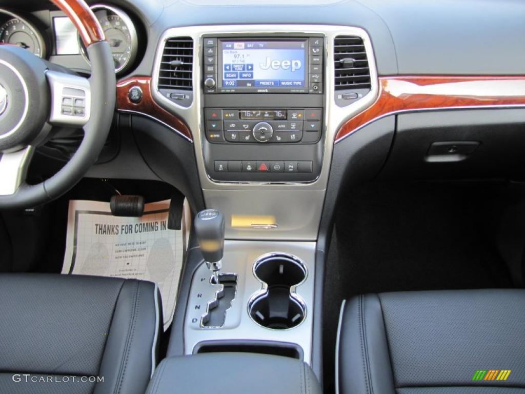 2011 Jeep Grand Cherokee Overland Black Dashboard Photo #38077639