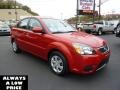 2010 Tropical Red Kia Rio LX Sedan  photo #1