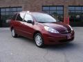 2008 Salsa Red Pearl Toyota Sienna LE AWD  photo #1