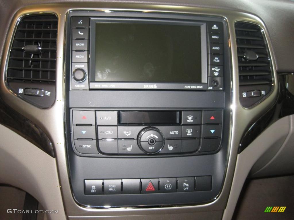 2011 Jeep Grand Cherokee Laredo X Package 4x4 Controls Photo #38115619