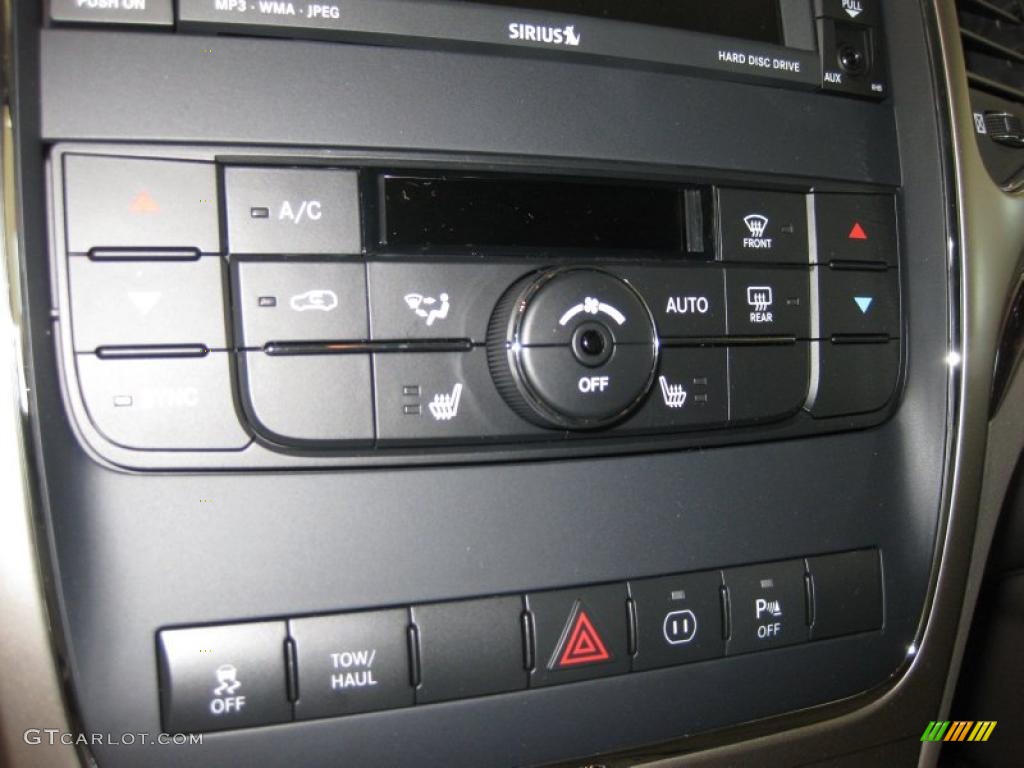 2011 Jeep Grand Cherokee Laredo X Package 4x4 Controls Photo #38115651