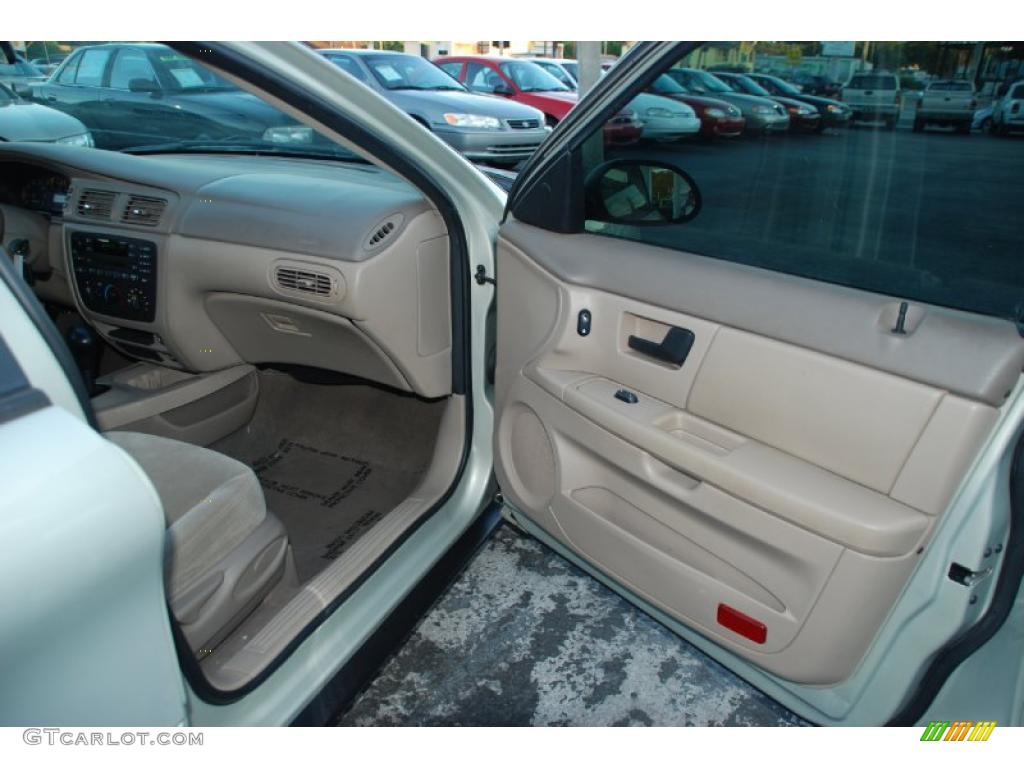 2004 Taurus SE Sedan - Gold Ash Metallic / Medium Parchment photo #16