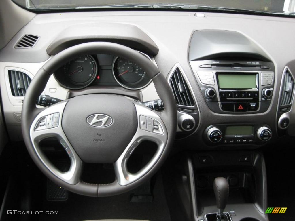 2011 Hyundai Tucson Limited Taupe Dashboard Photo #38214108