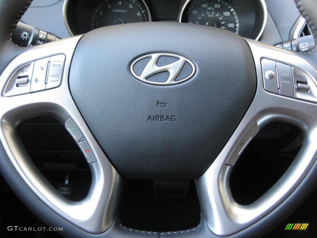 2011 Hyundai Tucson Limited Black/Saddle Steering Wheel Photo #38214472