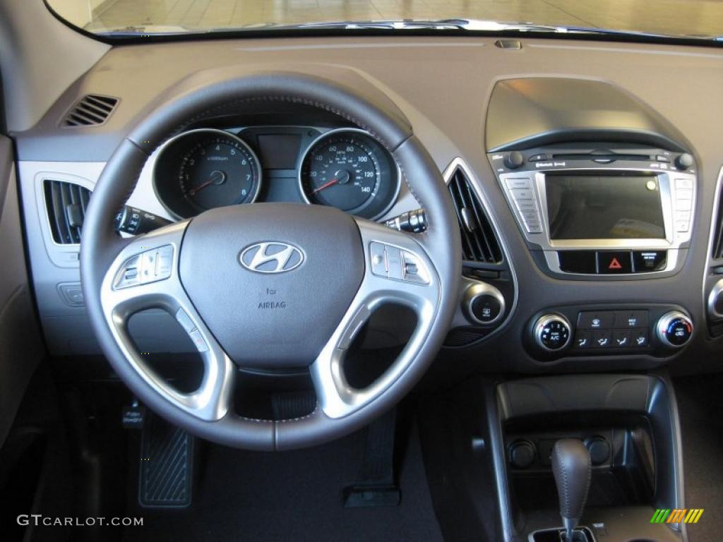 2011 Hyundai Tucson GLS Taupe Dashboard Photo #38215096