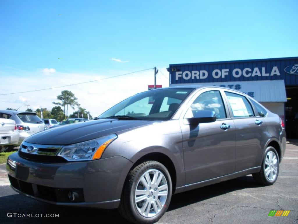 2011 Focus SEL Sedan - Sterling Gray Metallic / Medium Stone photo #1