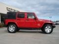 2011 Flame Red Jeep Wrangler Unlimited Sahara 4x4  photo #2