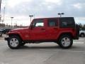 2011 Flame Red Jeep Wrangler Unlimited Sahara 4x4  photo #6