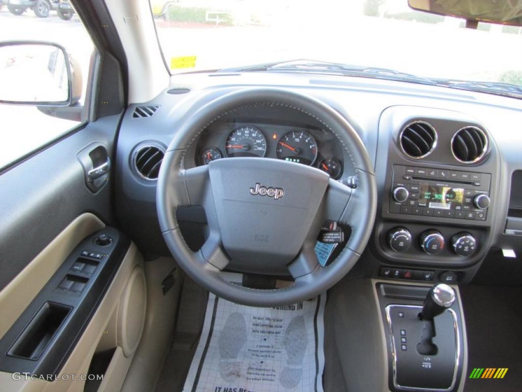 2010 Jeep Compass Sport Dark Slate Gray/Light Pebble Beige Steering Wheel Photo #38311947